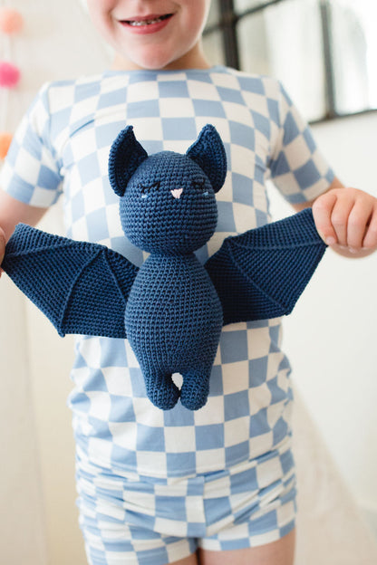 Bat in bedtime sleeping bag with bedtime checklist
