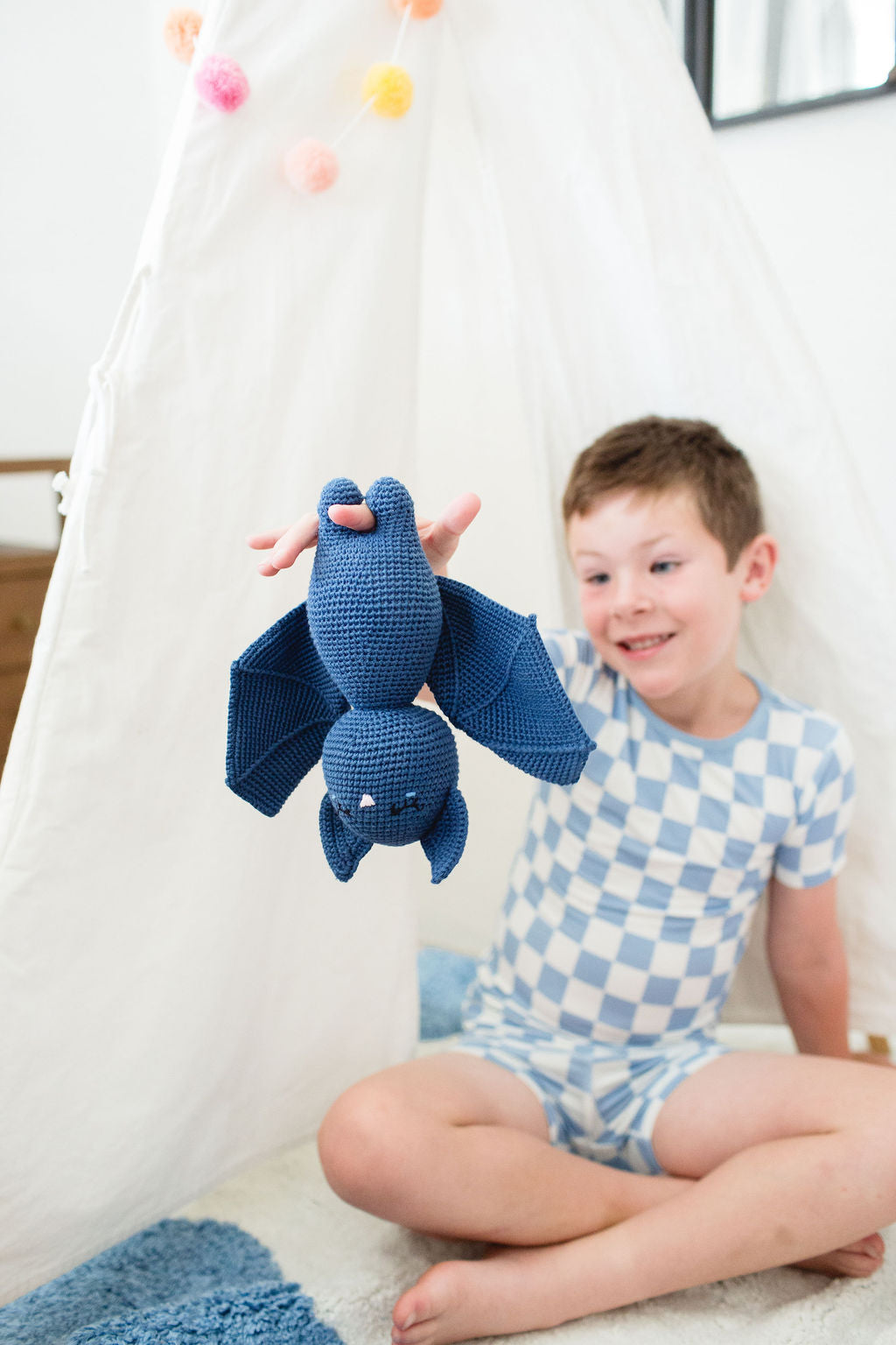 Bat in bedtime sleeping bag with bedtime checklist