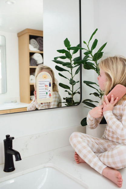 Bear in bedtime sleeping bag with bedtime and morning checklist